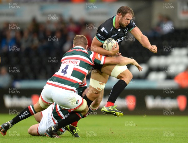 120816 - Ospreys v Leicester - Preseason Friendly -Tyler Ardron of Ospreys is tackled by Ed Salter of Leicester