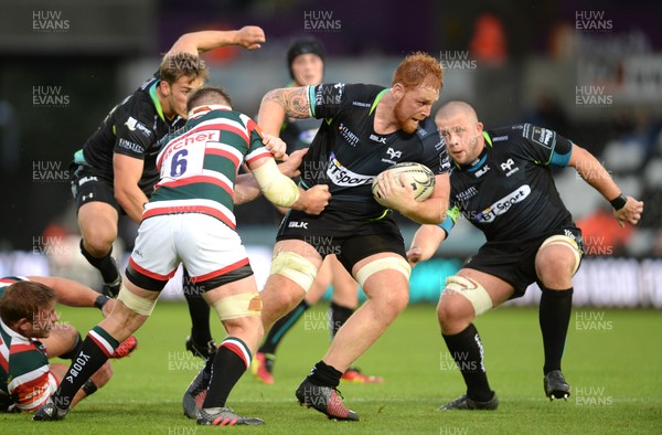 120816 - Ospreys v Leicester - Preseason Friendly -Dan Baker of Ospreys is tackled by Brendan O’Connor and Tom Youngs of Leicester