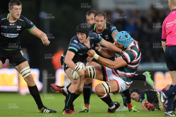 120816 - Ospreys v Leicester - Preseason Friendly -Sam Davies of Ospreys is tackled by Ed Salter of Leicester