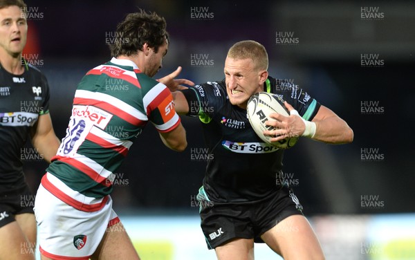 120816 - Ospreys v Leicester - Preseason Friendly -Ben John of Ospreys is tackled by Freddie Burns of Leicester