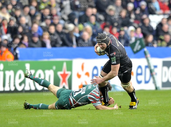 130113 - Ospreys v Leicester - Heineken Cup -    Ospreys'  Ian Gough, right, is tackled by Leicester's Tom Youngs  