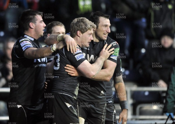 130113 - Ospreys v Leicester - Heineken Cup -   Ospreys' Jonathan Sprat, front, is congratulated by Joe Bearman after scoring his try  