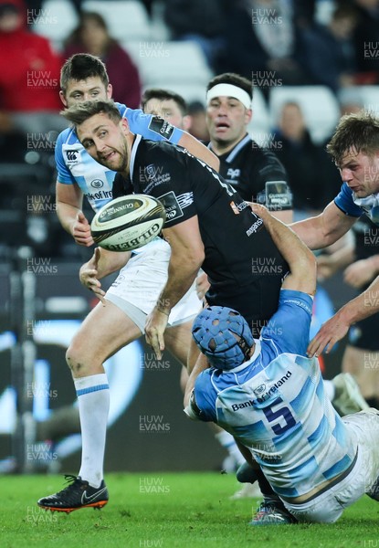 240318 - Ospreys v Leinster, Guinness PRO14 - Ashley Beck of Ospreys looks for support as he is tackled by Scott Fardy of Leinster
