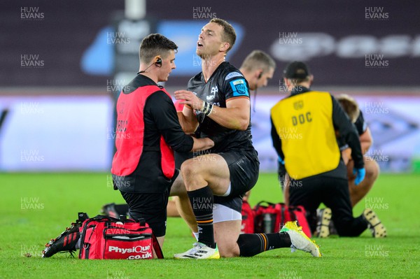 240922 - Ospreys v Emirates Lions - United Rugby Championship - George North of Ospreys receives treatment