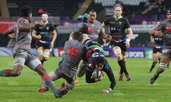 150117 - Ospreys v Lyon - European Rugby Challenge Cup - Sam Davies of Ospreys is tackled by Romain Loursac of Lyon by Chris Fairweather/Huw Evans Agency