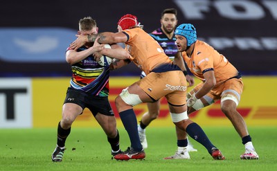 140123 - Ospreys v Montpellier - European Rugby Champions Cup - Jac Morgan of Ospreys is tackled by Bastien Chalureau of Montpellier