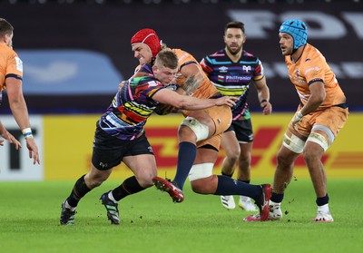 140123 - Ospreys v Montpellier - European Rugby Champions Cup - Jac Morgan of Ospreys is tackled by Bastien Chalureau of Montpellier