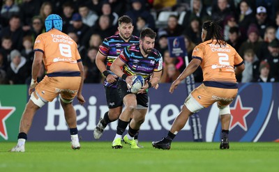 140123 - Ospreys v Montpellier - European Rugby Champions Cup - Scott Baldwin of Ospreys is challenged by Brandon Paenga-Amosa of Montpellier 