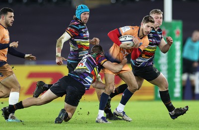 140123 - Ospreys v Montpellier - European Rugby Champions Cup - Vincent Rattez of Montpellier is tackled by Michael Collins of Ospreys 