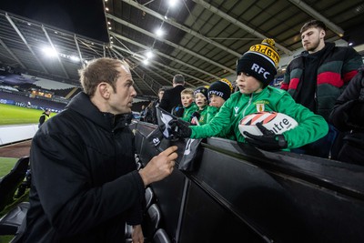 140123 - Ospreys v Montpellier - European Rugby Champions Cup - Alun Wyn Jones of Ospreys signs autographs