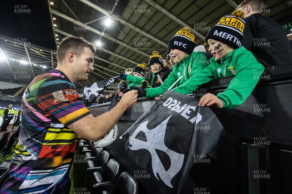 140123 - Ospreys v Montpellier - European Rugby Champions Cup - Michael Collins of Ospreys signs autographs
