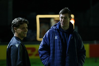 170126 - Ospreys v Montpellier Herault Rugby - EPCR Challenge Cup - Montpellier player Adam Beard, formerly of Ospreys, with Jack Walsh of Ospreys before the match