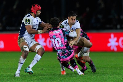 170126 - Ospreys v Montpellier Herault Rugby - EPCR Challenge Cup - Auguste Cadot of Montpellier is tackled by Jack Walsh of Ospreys