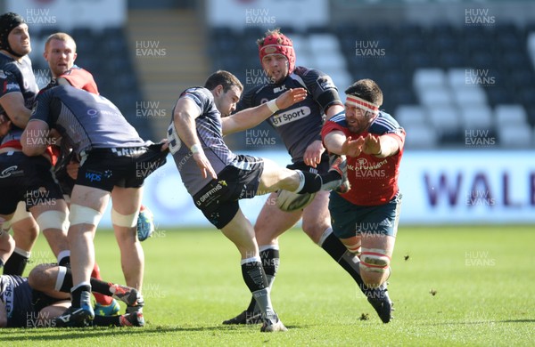 070315 - Ospreys v Munster - Guinness PRO12 -Tom Habberfield of Ospreys is charged down by Dave Kilcoyne of Munster