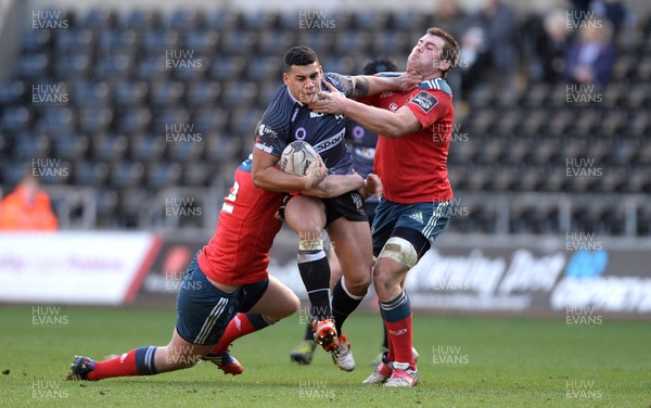 070315 - Ospreys v Munster - Guinness PRO12 -Josh Matavesi of Ospreys is tackled by Denis Hurley and CJ Stander of Munster