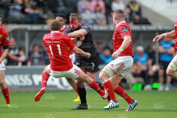 130915 - Ospreys v Munster - Guinness PRO12 - Sam Parry of Ospreys charges through Stephen Fitzgerald of Munster