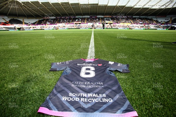 130915 - Ospreys v Munster, Guinness PRO12 - A number 6 shirt in memory of former All Black and Ospreys player Jerry Collins who died during the summer is laid on the pitch at the Liberty Stadium before the match