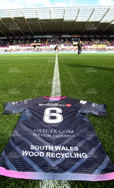 130915 - Ospreys v Munster, Guinness PRO12 - A number 6 shirt in memory of former All Black and Ospreys player Jerry Collins who died during the summer is laid on the pitch at the Liberty Stadium before the match