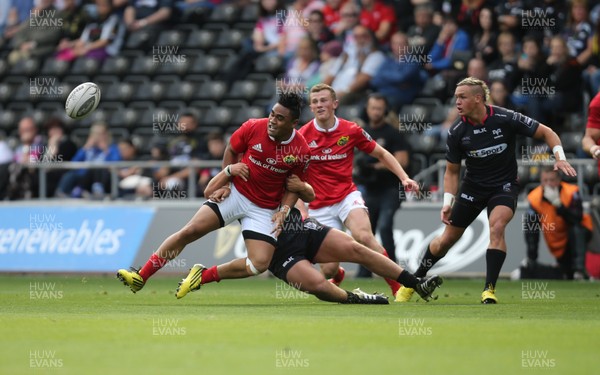 130915 - Ospreys v Munster, Guinness PRO12 - Francis Saili of Munster is tackled by Nicky Smith of Ospreys