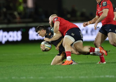 201225 - Ospreys v Munster, United Rugby Championship - Reuben Morgan-Williams of Ospreys is tackled by Jeremy Loughman of Munster