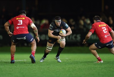 201225 - Ospreys v Munster, United Rugby Championship - Ryan Smith of Ospreys takes on Niall Scannell of Munster and Michael Ala’alatoa of Munster