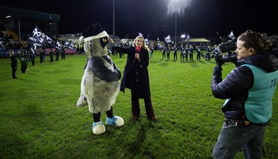 201225 - Ospreys v Munster, United Rugby Championship - TV broadcast presenter Catrin Heledd with Ozzy