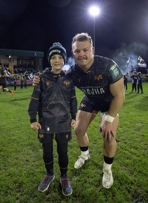 201225 - Ospreys v Munster, United Rugby Championship - Dewi Lake of Ospreys with match mascot
