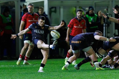 201225 - Ospreys v Munster - United Rugby Championship - Reuben Morgan-Williams of Ospreys kicks the ball