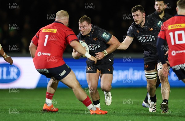 201225 - Ospreys v Munster, United Rugby Championship - Dewi Lake of Ospreys takes on Jeremy Loughman of Munster