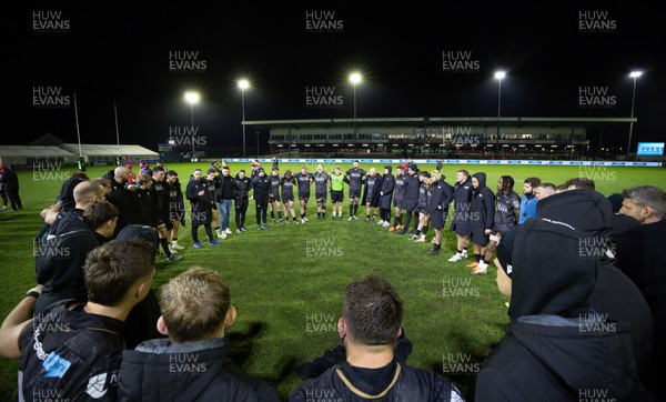 201225 - Ospreys v Munster, United Rugby Championship - The Ospreys huddle up at the end of the match