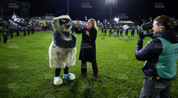 201225 - Ospreys v Munster, United Rugby Championship - TV broadcast presenter Catrin Heledd with Ozzy