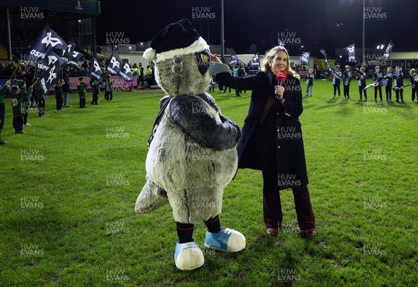 201225 - Ospreys v Munster, United Rugby Championship - TV broadcast presenter Catrin Heledd with Ozzy