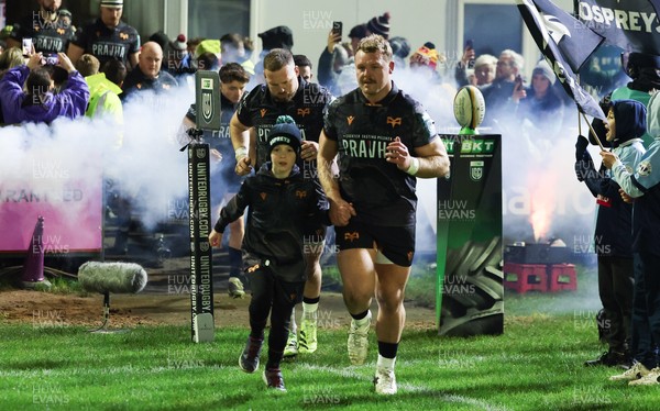 201225 - Ospreys v Munster, United Rugby Championship - Dewi Lake of Ospreys with match mascot