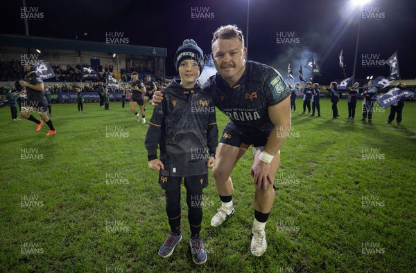201225 - Ospreys v Munster, United Rugby Championship - Dewi Lake of Ospreys with match mascot