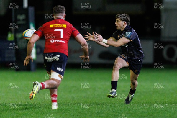 201225 - Ospreys v Munster - United Rugby Championship - Dan Edwards of Ospreys receives the ball