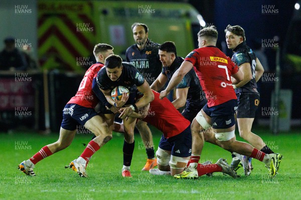 201225 - Ospreys v Munster - United Rugby Championship - Max Nagy of Ospreys is tackled