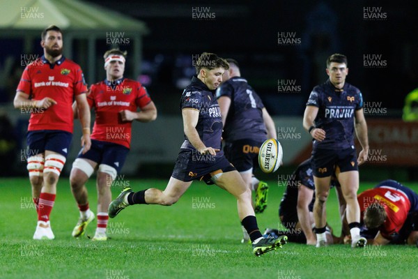 201225 - Ospreys v Munster - United Rugby Championship - Dan Edwards of Ospreys kicks the ball