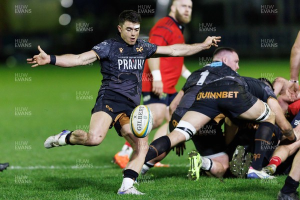 201225 - Ospreys v Munster - United Rugby Championship - Reuben Morgan-Williams of Ospreys kicks the ball