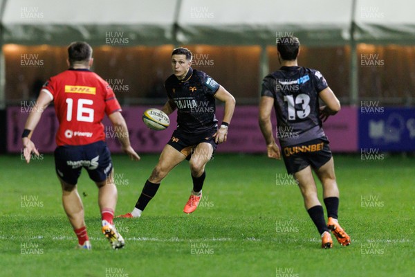 201225 - Ospreys v Munster - United Rugby Championship - Max Nagy of Ospreys takes on Lee Barron of Munster