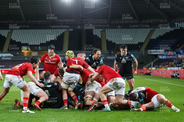 220324 - Ospreys v Munster - United Rugby Championship - Sam Parry of Ospreys (right) scores a try