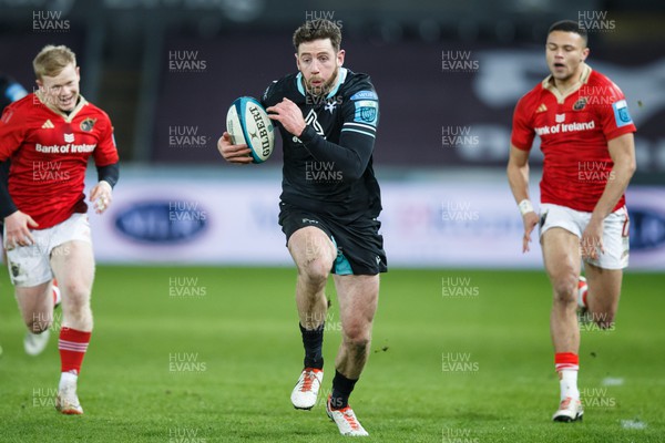 220324 - Ospreys v Munster - United Rugby Championship - Alex Cuthbert of Ospreys heads for the try line before injuring his hamstring