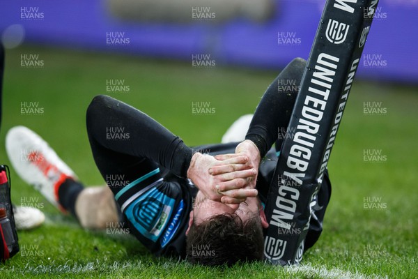 220324 - Ospreys v Munster - United Rugby Championship - Alex Cuthbert of Ospreys injured in pain