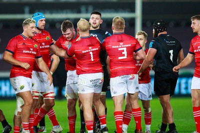 231021 - Ospreys v Munster - United Rugby Championship - Rhys Davies of Ospreys and Jeremy Loughman of Munster have a disagreement