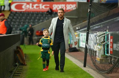 160917 - Ospreys v Munster - GuinnessPro12 - Rhys Webb of Ospreys with son Jesse after the Half Time tag rugby