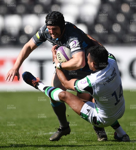 030421 - Ospreys v Newcastle Falcons - European Rugby Challenge Cup - Dan Evans of Ospreys is tackled by George Wacokecoke of Newcastle