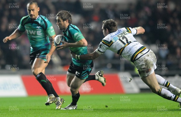 05.11.09 - Ospreys v Northampton Saints - LV= Cup - Andrew Bishop of Ospreys takes on John Clarke(R) of Northampton. 