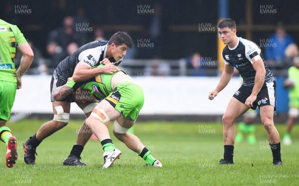 110818 - Ospreys v Northampton Saints - Preseason Friendly -  Pictured is Guido Volpi getting tackled