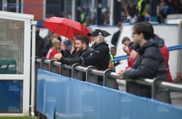 110818 - Ospreys v Northampton Saints - Preseason Friendly - Fan brave the heavy rain ahead of kick off
