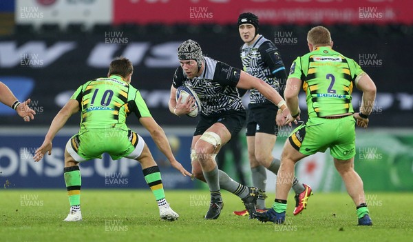 171217 - Ospreys v Northampton Saints - European Rugby Champions Cup - Dan Lydiate of Ospreys is tackled by Piers Francis of Northampton