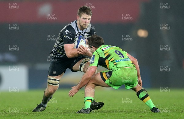 171217 - Ospreys v Northampton Saints - European Rugby Champions Cup - Olly Cracknell of Ospreys is tackled by Nic Groom of Northampton